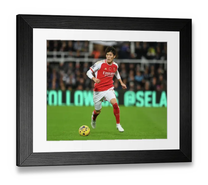 Framed Print : Arsenal's Tomiyasu Faces Newcastle in Premier League Clash (2023-24)
