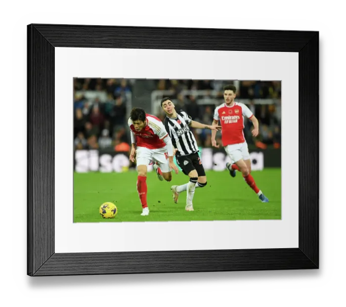 Framed Print : Intense Battle: Tomiyasu vs Almiron at St. James Park - Newcastle United vs Arsenal FC, Premier League 2023-24 Framed Print : Intense Battle: Tomiyasu vs Almiron at St. James Park - Newcastle United vs Arsenal FC, Premier League 2023-24