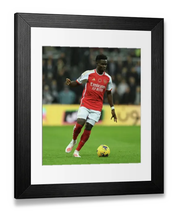 Framed Print : Bukayo Saka in Action: Arsenal vs. Newcastle United, Premier League 2023-24 Framed Print : Bukayo Saka in Action: Arsenal vs. Newcastle United, Premier League 2023-24