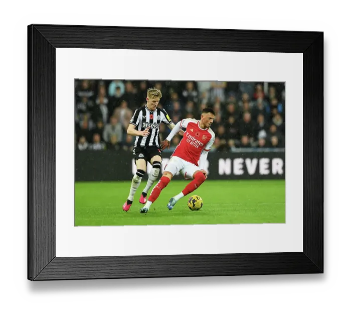 Framed Print : Battle for Possession: Newcastle United vs. Arsenal FC - Premier League 2023-24