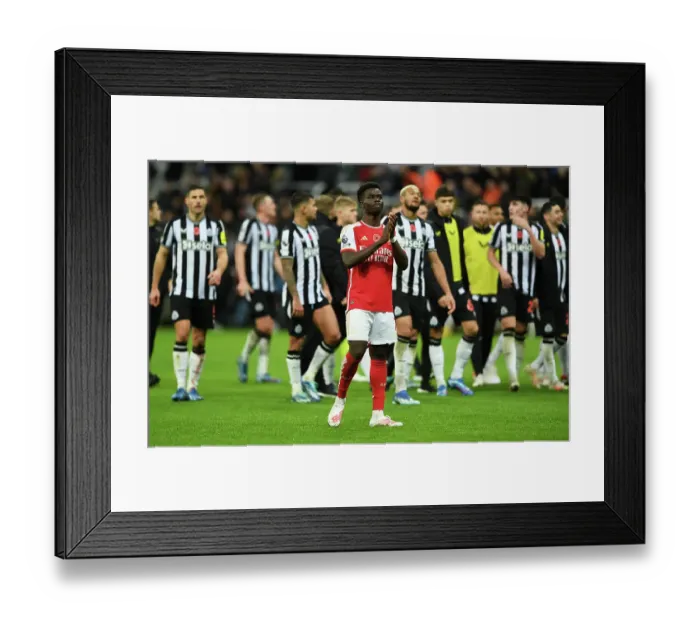 Framed Print : Bukayo Saka Applauds Fans After Arsenal's Defeat at Newcastle United (Newcastle United vs Arsenal 2023-24)
