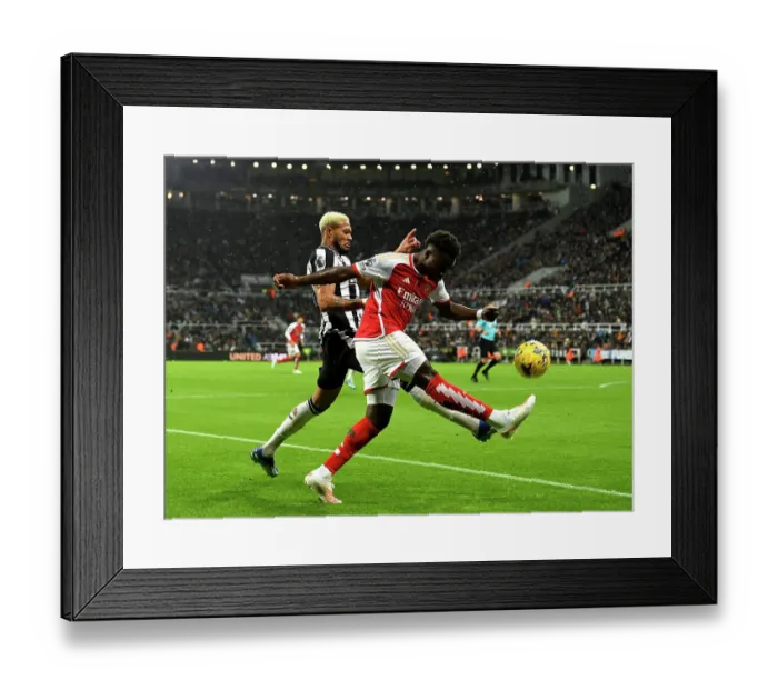 Framed Print : Newcastle United vs. Arsenal FC: A Battle for Possession - Premier League 2023-24