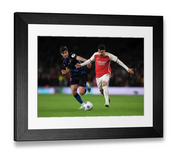 Framed Print : Martinelli's Escape: Arsenal's Thrilling Showdown Against Sevilla in the Champions League Framed Print : Martinelli's Escape: Arsenal's Thrilling Showdown Against Sevilla in the Champions League
