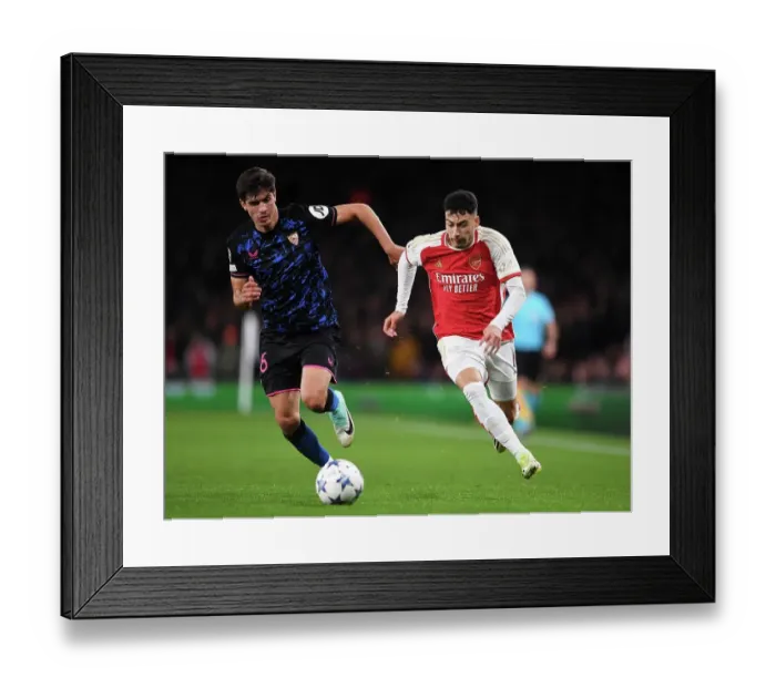 Framed Print : Martinelli Battles Past Juanlu: Arsenal vs Sevilla in UEFA Champions League Group B (2023 / 24) Framed Print : Martinelli Battles Past Juanlu: Arsenal vs Sevilla in UEFA Champions League Group B (2023 / 24)