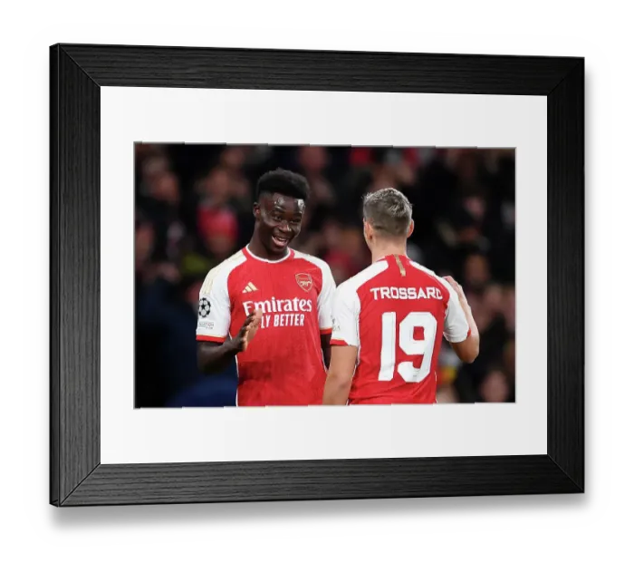 Framed Print : Arsenal Rejoice: Trossard Scores First Goal in 2023-24 Champions League Victory