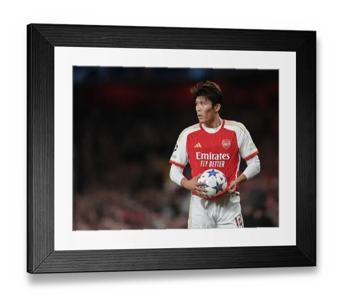 Framed Print : Takehiro Tomiyasu in Action: Arsenal vs Sevilla - UEFA Champions League 2023 / 24 Framed Print : Takehiro Tomiyasu in Action: Arsenal vs Sevilla - UEFA Champions League 2023 / 24