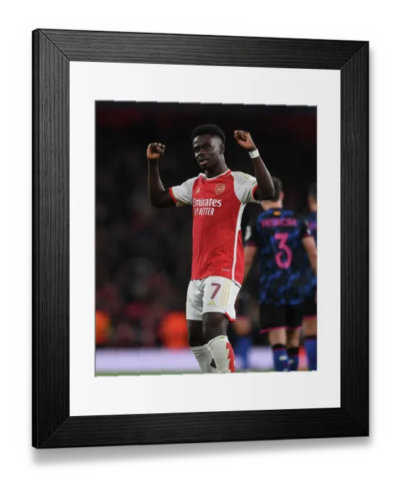 Framed Print : Bukayo Saka Scores His Second: Arsenal Dominates Sevilla in 2023-24 UEFA Champions League