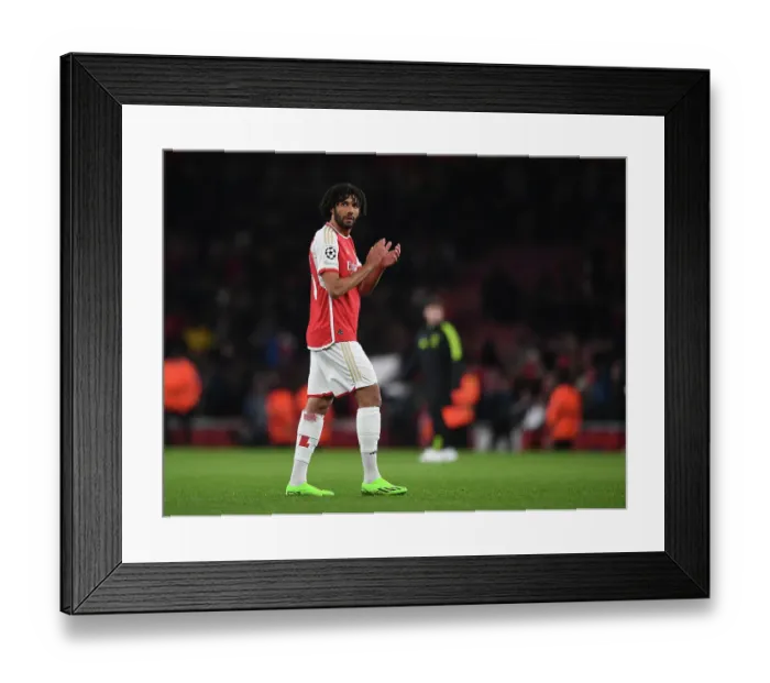Framed Print : Arsenal's Mohamed Elneny Celebrates with Fans after Securing Group B Win vs Sevilla FC, UEFA Champions League 2023 / 24 Framed Print : Arsenal's Mohamed Elneny Celebrates with Fans after Securing Group B Win vs Sevilla FC, UEFA Champions League 2023 / 24