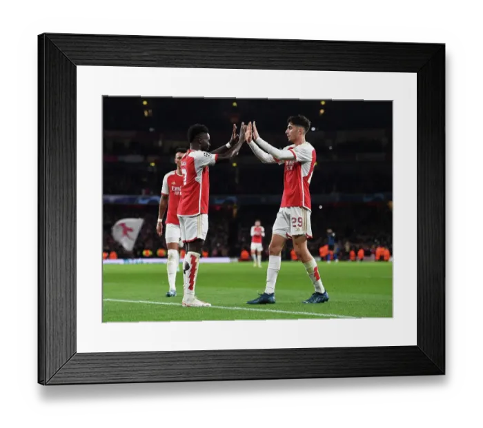 Framed Print : Arsenal Celebrate Saka's Brace: Arsenal FC vs Sevilla FC, UEFA Champions League 2023 / 24