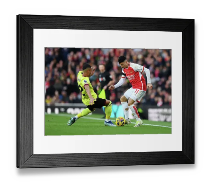 Framed Print : Arsenal vs Burnley: Gabriel Martinelli Faces Off Against Vitinho in Intense Premier League Clash (2023-24) Framed Print : Arsenal vs Burnley: Gabriel Martinelli Faces Off Against Vitinho in Intense Premier League Clash (2023-24)