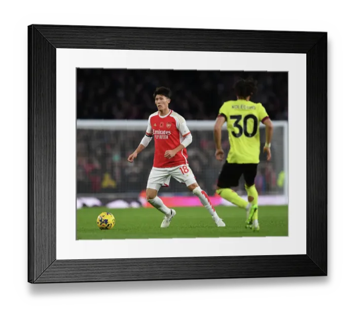 Framed Print : Tomiyasu's Standout Performance: Arsenal Triumphs Over Burnley in 2023-24 Premier League Framed Print : Tomiyasu's Standout Performance: Arsenal Triumphs Over Burnley in 2023-24 Premier League