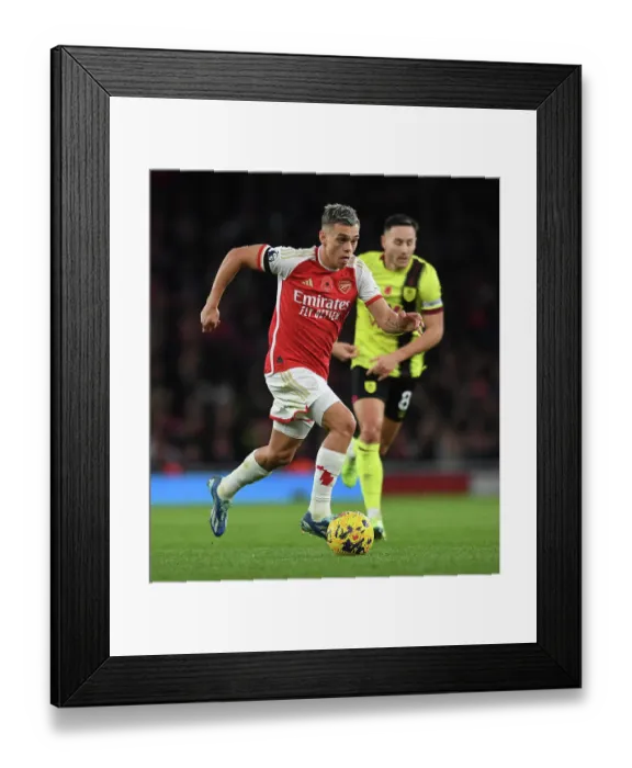 Framed Print : Arsenal's Trossard Shines: Premier League Clash Against Burnley (2023-24)