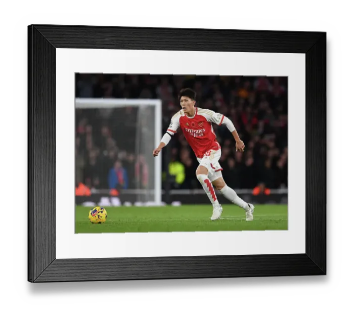 Framed Print : Arsenal's Tomiyasu in Action against Burnley in the Premier League (2023-24) Framed Print : Arsenal's Tomiyasu in Action against Burnley in the Premier League (2023-24)