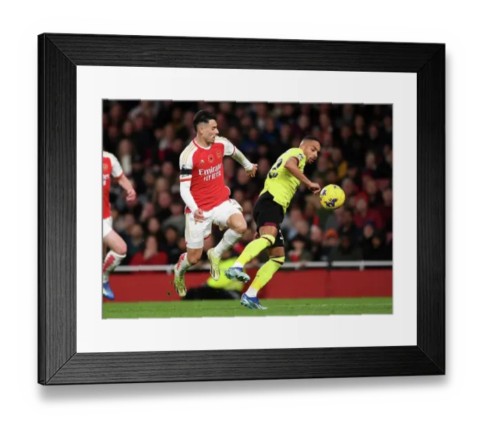 Framed Print : Arsenal vs Burnley: Gabriel Martinelli Fends Off Vitinho Challenge in Premier League Clash (2023-24) Framed Print : Arsenal vs Burnley: Gabriel Martinelli Fends Off Vitinho Challenge in Premier League Clash (2023-24)