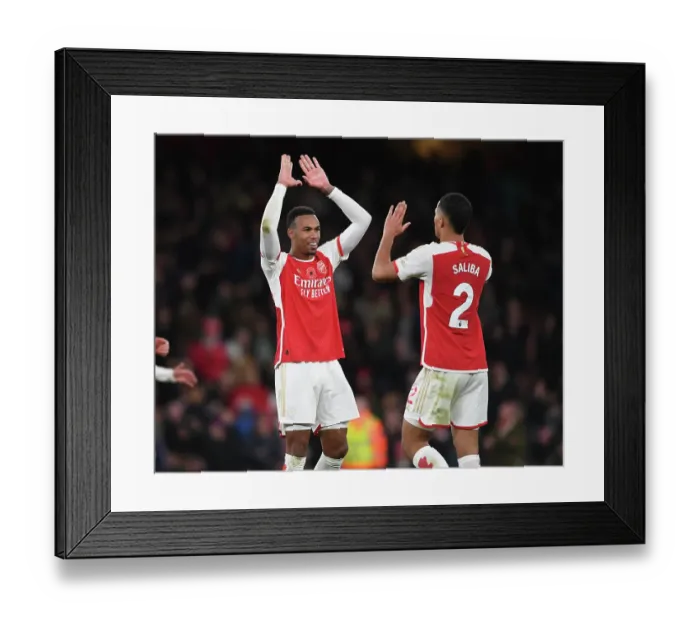 Framed Print : Arsenal's Magalhaes and Saliba: Victory Celebration (2023-24)