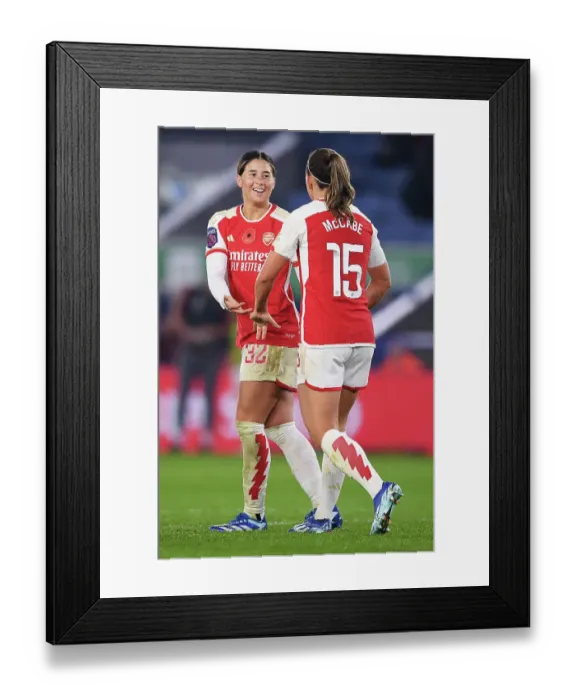 Framed Print : Arsenal's Dominance: Kyra Cooney-Cross and Katie McCabe Celebrate Fourth Goal vs. Leicester City in Barclays Women's Super League