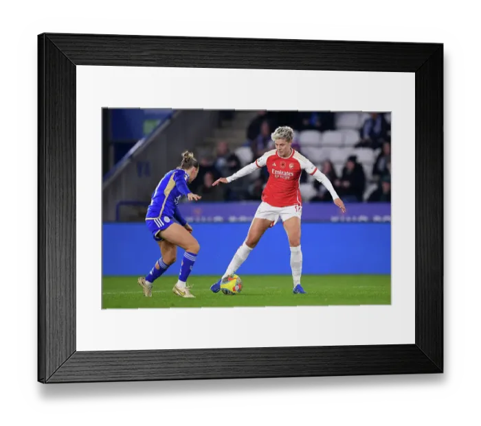 Framed Print : Leicester City vs. Arsenal FC: Intense Battle in Barclays Women's Super League