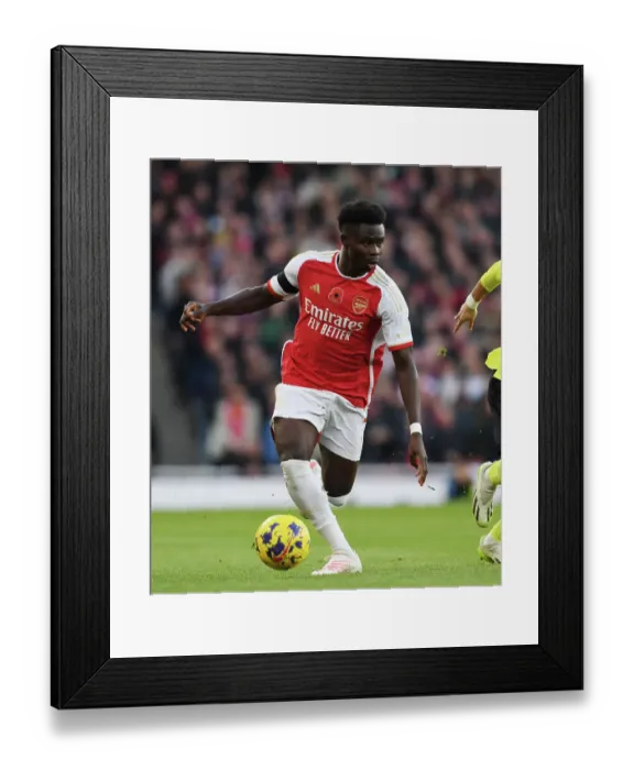 Framed Print : Saka in Action: Arsenal's Star Performer vs. Burnley (2023-24)