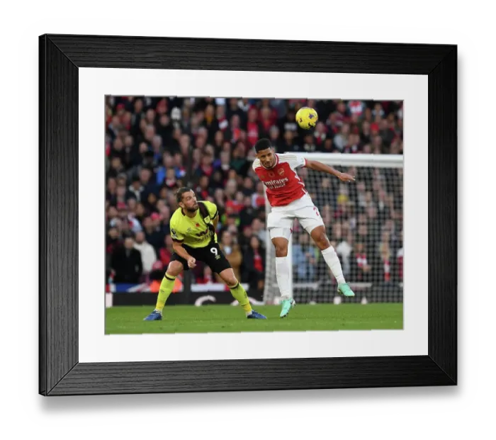 Framed Print : Arsenal vs Burnley: William Saliba Under Pressure in Premier League Clash (2023-24)