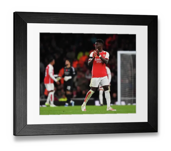 Framed Print : Arsenal's Bukayo Saka Acknowledges Fans Amidst the Drama: Arsenal FC vs Burnley FC, Premier League 2023-24