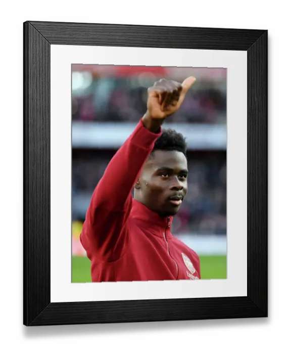 Framed Print : Arsenal's Bukayo Saka Acknowledges Fans Before Arsenal vs Burnley, Premier League 2023-24