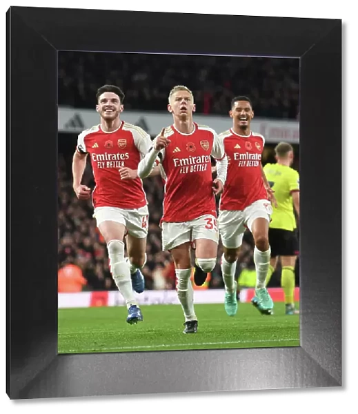 Arsenal's Triumph: Zinchenko, Rice, and Saliba's Epic Goal Celebration (2023-24) - Arsenal's Star Players Rejoice in a Memorable Moment at Emirates Stadium