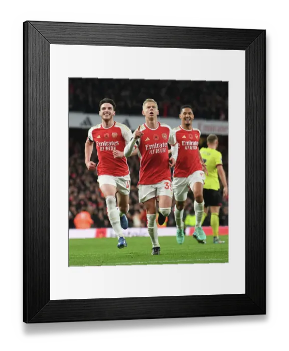 Framed Print : Arsenal's Triumph: Zinchenko, Rice, and Saliba's Epic Goal Celebration (2023-24) - Arsenal's Star Players Rejoice in a Memorable Moment at Emirates Stadium