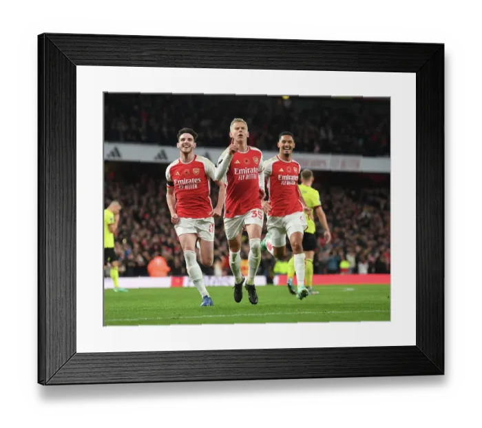 Framed Print : Arsenal's Triumph: Unforgettable Goal Celebration by Zinchenko, Rice, and Saliba (2023-24)
