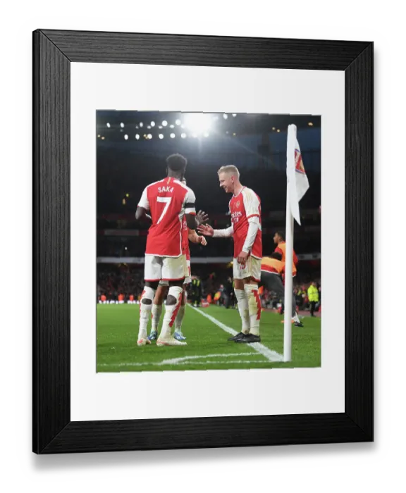 Framed Print : Arsenal's Zinchenko, Trossard, and Saka Celebrate Goals Against Burnley in 2023-24 Premier League