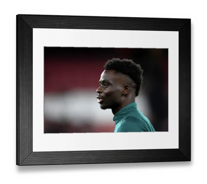 Framed Print : Arsenal FC vs Sevilla FC: Bukayo Saka Warming Up - UEFA Champions League 2023 / 24 Framed Print : Arsenal FC vs Sevilla FC: Bukayo Saka Warming Up - UEFA Champions League 2023 / 24