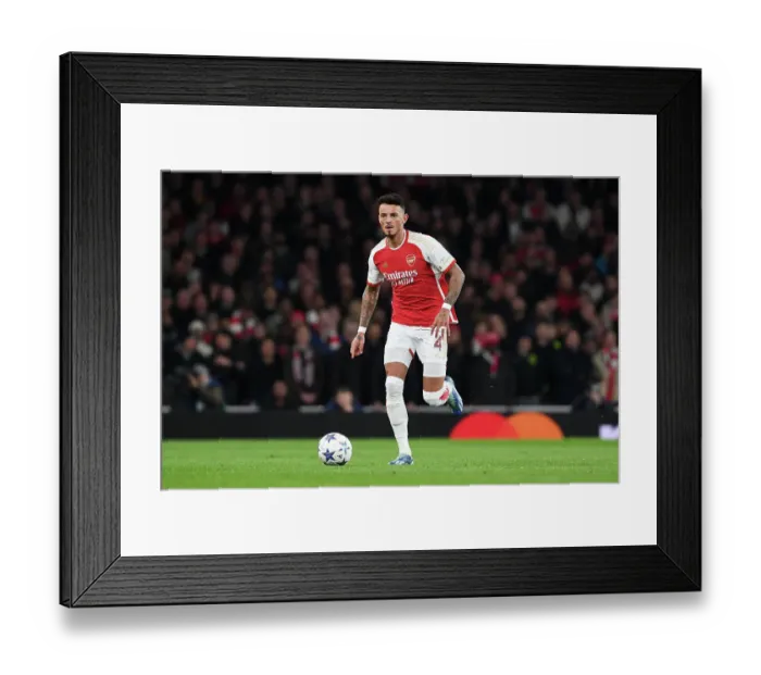 Framed Print : Arsenal's Ben White in Action: Arsenal vs Sevilla, UEFA Champions League Group B, 2023 / 24