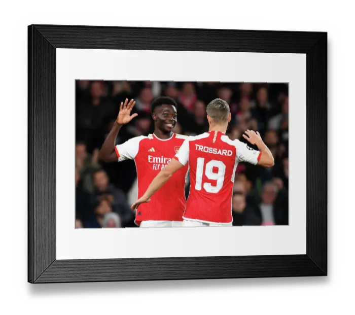 Framed Print : Saka Brace: Arsenal Takes 2-0 Lead Over Sevilla in Champions League Framed Print : Saka Brace: Arsenal Takes 2-0 Lead Over Sevilla in Champions League