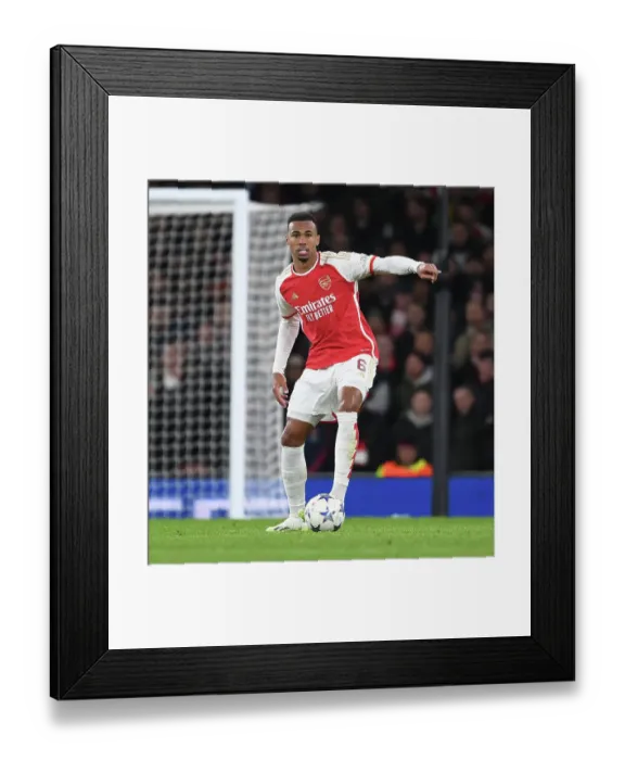 Framed Print : Arsenal's Gabriel Stands Firm Against Sevilla in UEFA Champions League Clash Framed Print : Arsenal's Gabriel Stands Firm Against Sevilla in UEFA Champions League Clash