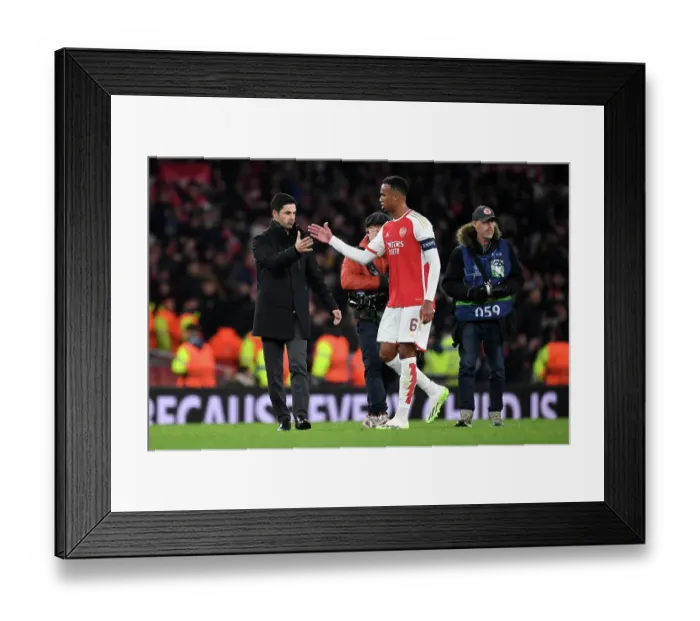 Framed Print : Mikel Arteta Consoles Gabriel: A Moment of Peace Amidst Arsenal's UEFA Champions League Struggle (Arsenal vs Sevilla, 2023 / 24)