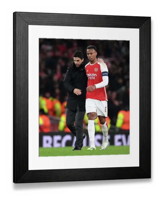Framed Print : Mikel Arteta Comforts Gabriel: A Moment of Tranquility Amidst Arsenal's UEFA Champions League Turmoil (Arsenal vs Sevilla, 2023 / 24)