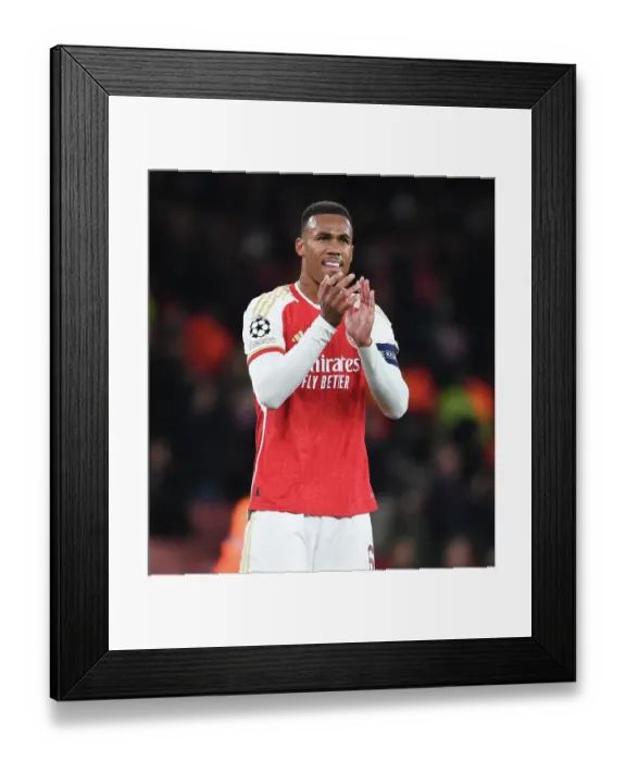 Framed Print : Arsenal's Gabriel Stands Firm Against Sevilla in UEFA Champions League Clash Framed Print : Arsenal's Gabriel Stands Firm Against Sevilla in UEFA Champions League Clash