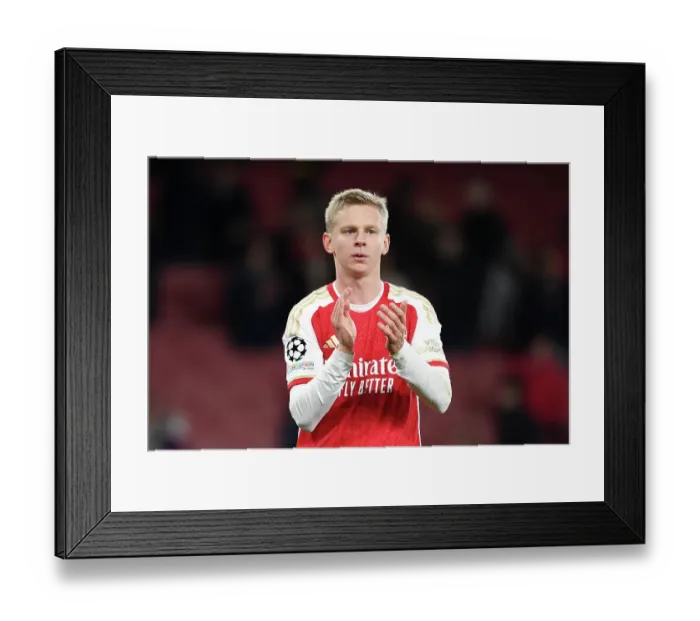 Framed Print : Arsenal's Zinchenko Applauds Fans After UEFA Champions League Victory vs Sevilla (2023-24) Framed Print : Arsenal's Zinchenko Applauds Fans After UEFA Champions League Victory vs Sevilla (2023-24)