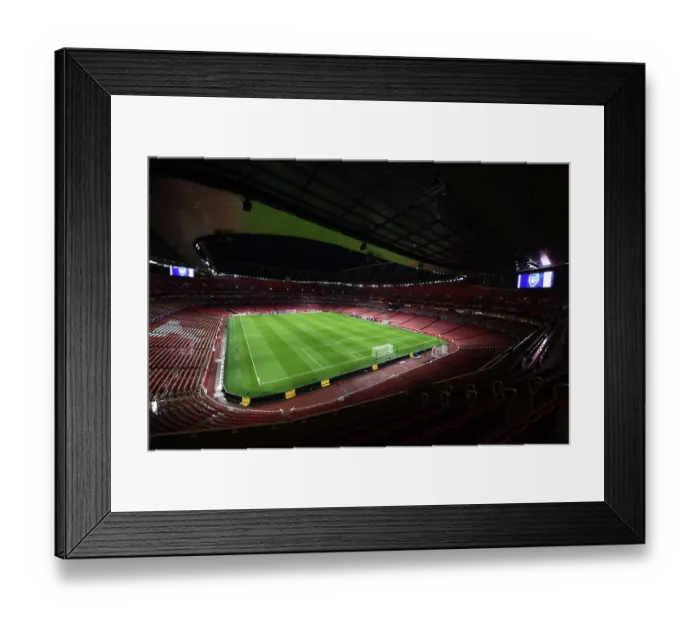 Framed Print : Arsenal FC vs Sevilla FC: A Peek into the Electric Atmosphere of Emirates Stadium during the UEFA Champions League Match, 2023 / 24