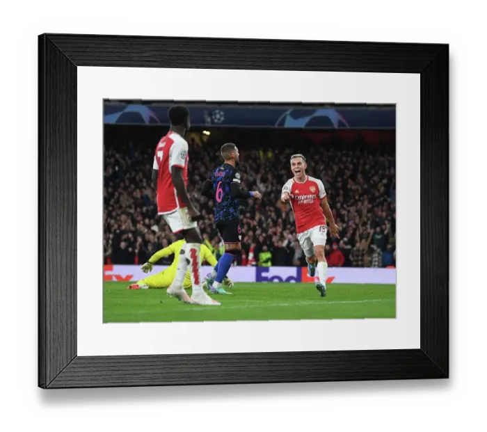 Framed Print : Arsenal Celebrate First Goal Against Sevilla in 2023-24 Champions League