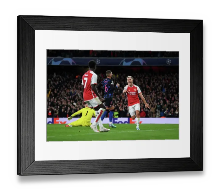Framed Print : Arsenal's Trossard Scores First Goal: Arsenal FC vs Sevilla FC, UEFA Champions League 2023 / 24