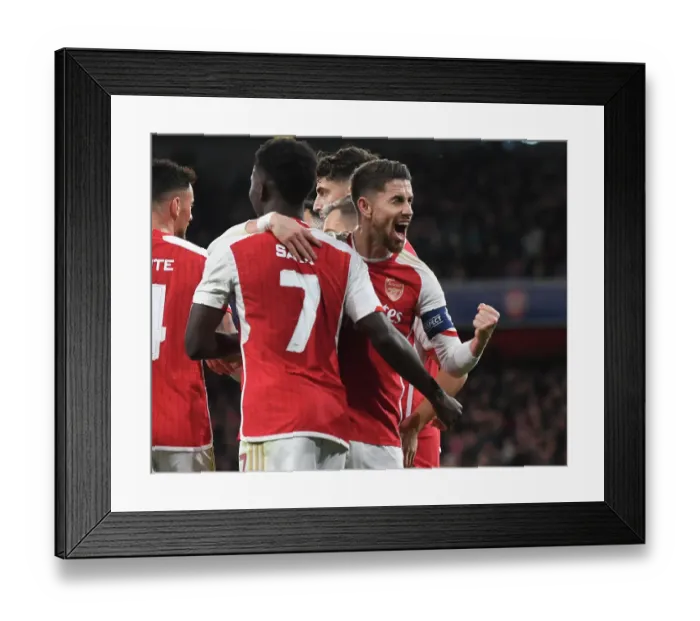 Framed Print : Arsenal vs Sevilla: Trossard Scores First Goal as Gunners Take the Lead in Champions League Group B