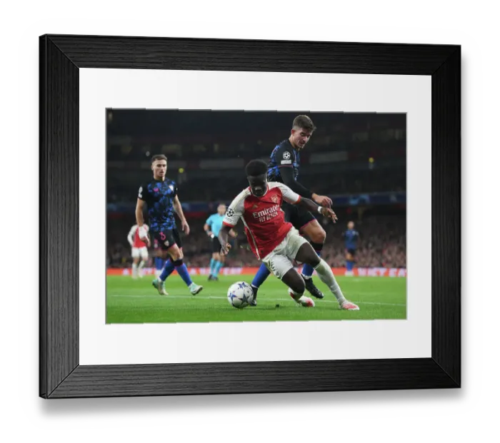 Framed Print : Arsenal's Bukayo Saka in Action: Arsenal vs Sevilla, 2023-24 UEFA Champions League