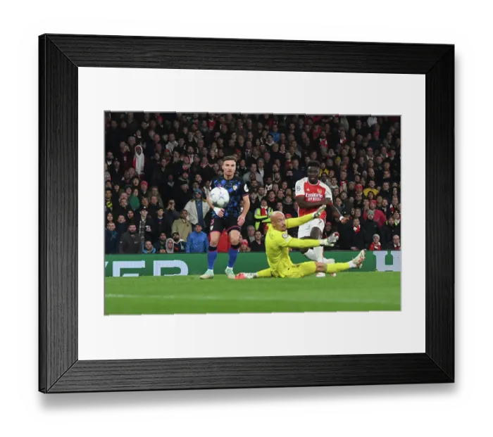 Framed Print : Bukayo Saka Scores His Second: Arsenal's Victory over Sevilla in the 2023-24 UEFA Champions League