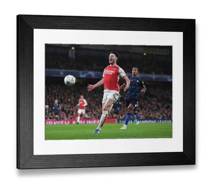 Framed Print : Battle in Group B: Declan Rice Fights for Arsenal's Victory over Sevilla in the 2023 / 24 UEFA Champions League