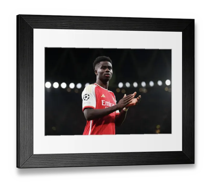 Framed Print : Arsenal's Bukayo Saka Applauding Fans: Arsenal FC vs Sevilla FC, UEFA Champions League 2023 / 24