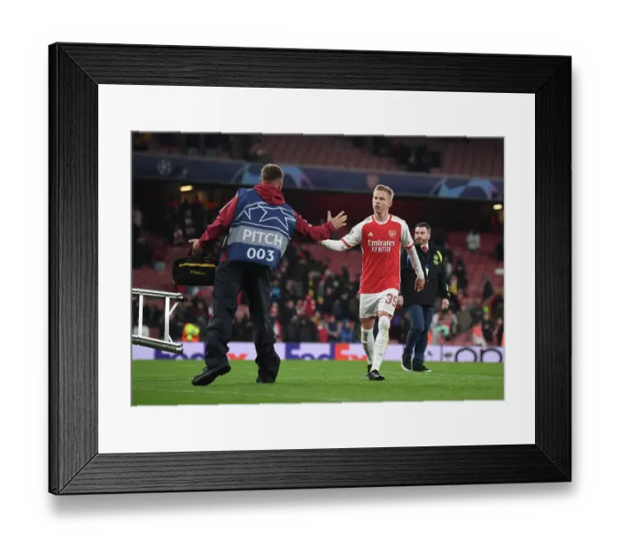 Framed Print : A Heartfelt Moment: Oleksandr Zinchenko's Unexpected Friendship with an Arsenal Groundsman