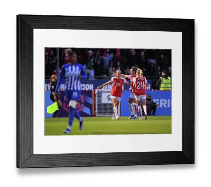 Framed Print : Arsenal Women's Team Celebrates Caitlin Foord's Goal Against Brighton & Hove Albion in Barclays WSL (2023-24)