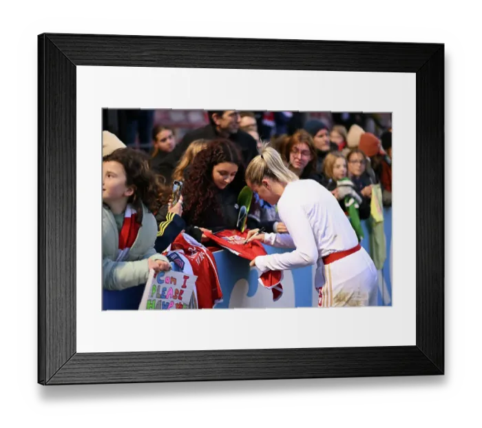 Framed Print : Arsenal Women's Triumph at Brighton: Alessia Russo Celebrates with Fan after Match Win Framed Print : Arsenal Women's Triumph at Brighton: Alessia Russo Celebrates with Fan after Match Win