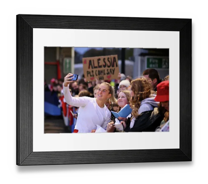 Framed Print : Arsenal Women Celebrate Victory at Brighton: Alessia Russo Leads the Charge