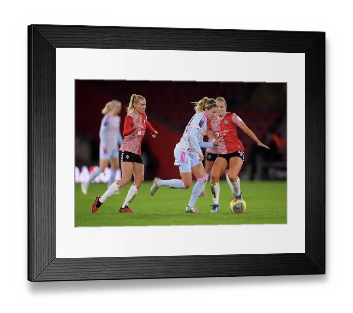 Framed Print : Arsenal vs Southampton: A Fight for Supremacy in the FA Women's Continental Tyres League Cup at St. Mary's Stadium